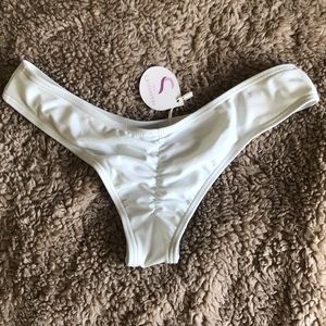 White cheeky swim bottoms